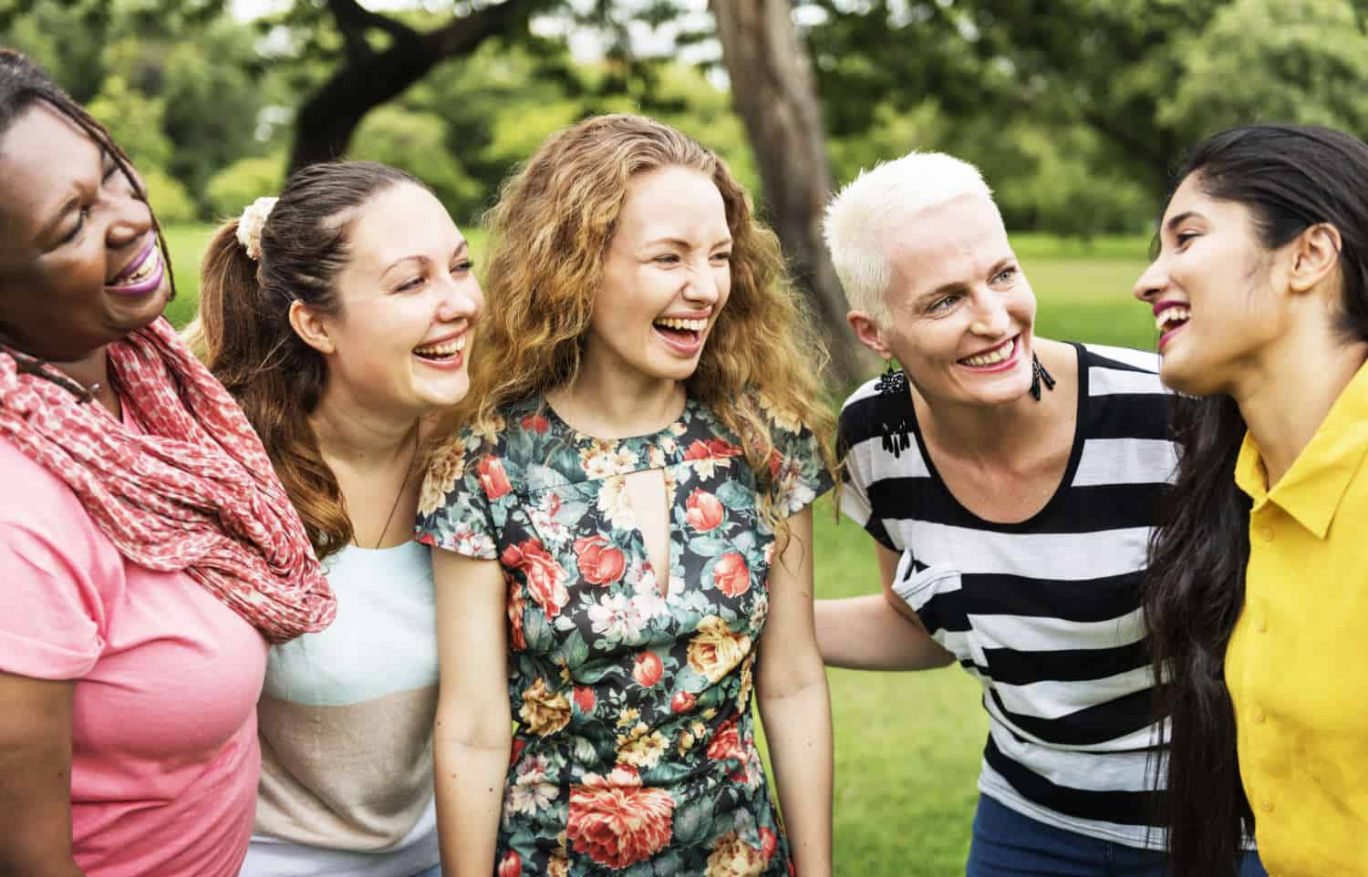 Photo of a group of women smiling and having fun